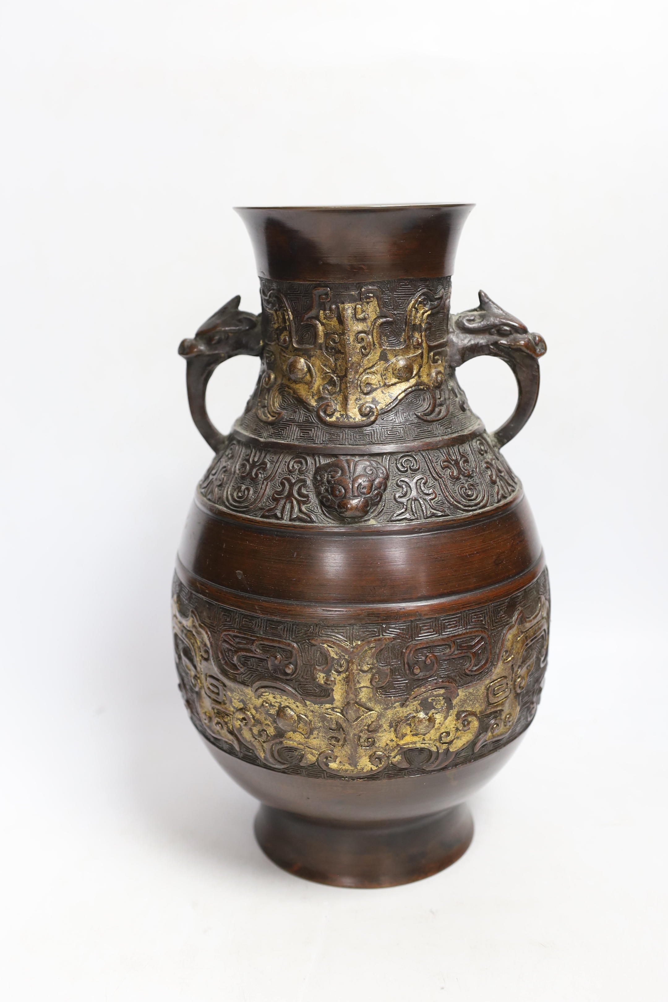 A Chinese gold splashed bronze vase, Qing period, 30cm